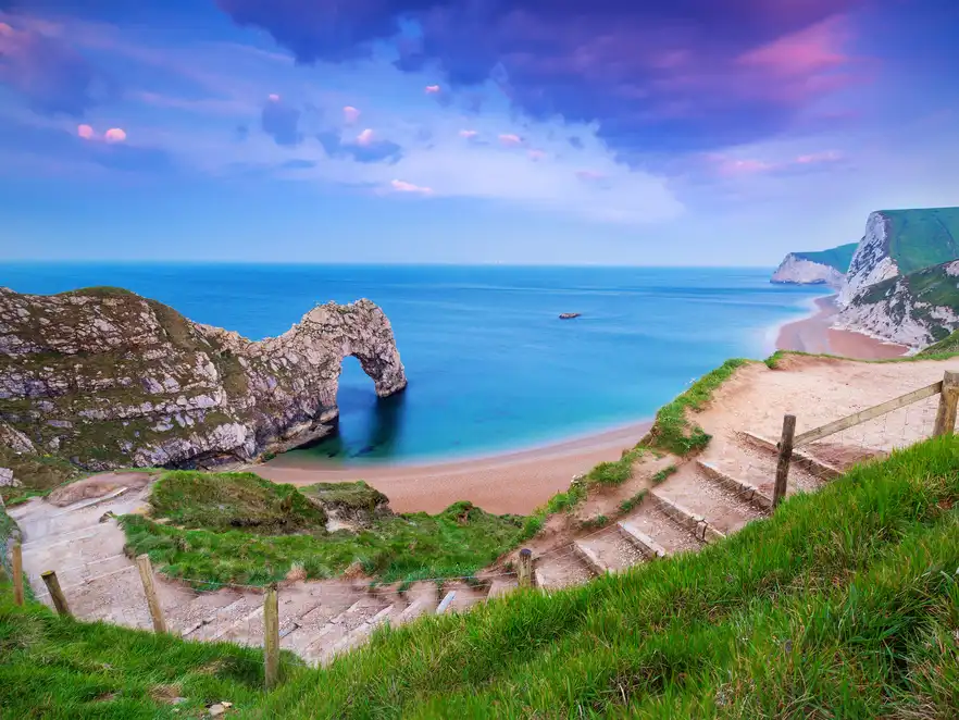 Jurassic Coast of Dorset, Sonnenaufgang über Durdle Door, UK