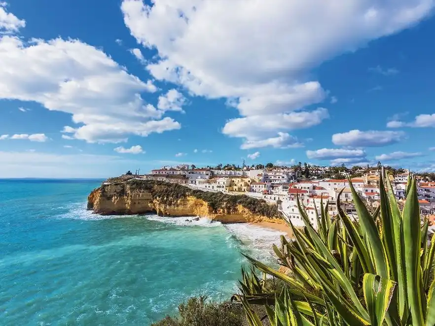 Beach of Carvoeiro in Portugal. Marine street scene.